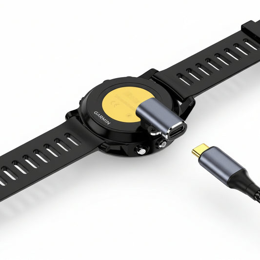 Smartwatch with charging cable on a white background