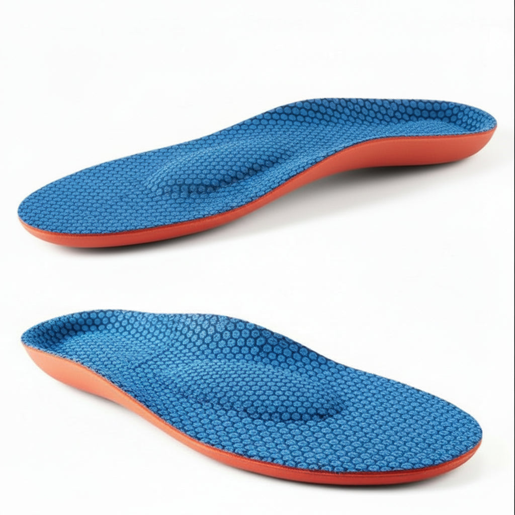 Orange and blue shoe insole with Peakmotion branding on a white background
