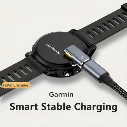 Smartwatch with charging cable on a white background