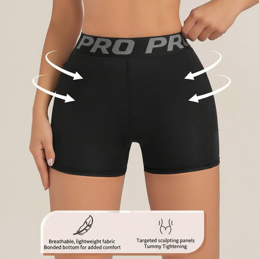 Black athletic shorts with 'PRO' waistband on a neutral background